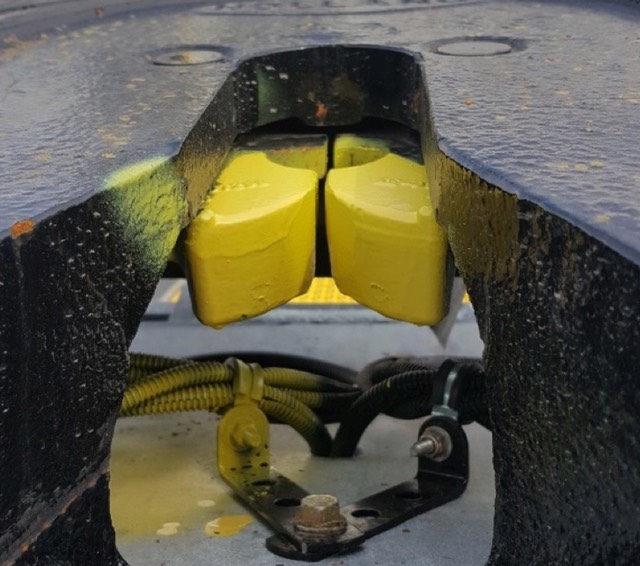 Yard truck trailer switcher Driver Safety 5th wheel King Pin Camera #3 Yellow Painted 5th wheel jaws closeup